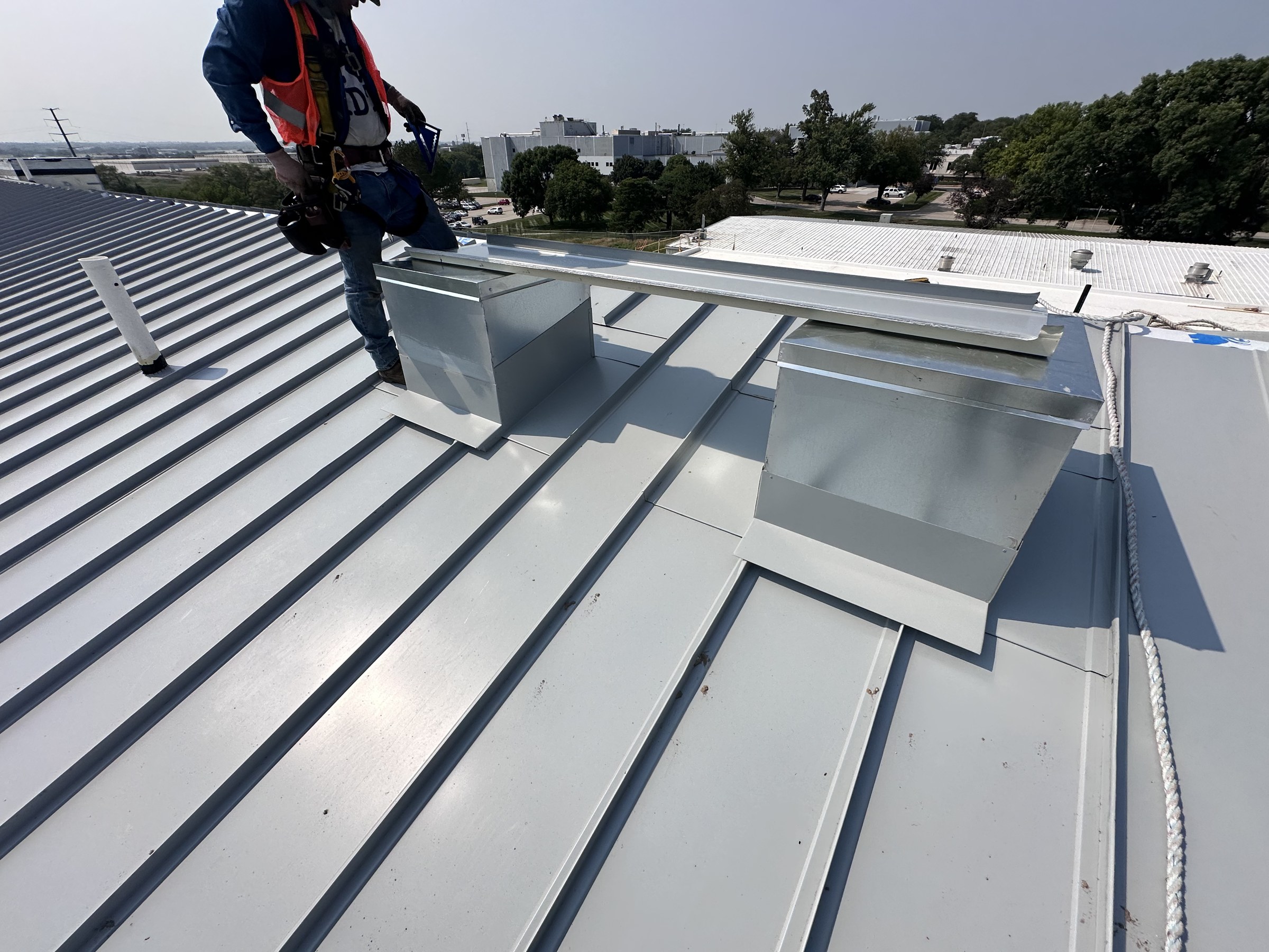 Commercial metal roofing and custom flashing by Flores Roofing