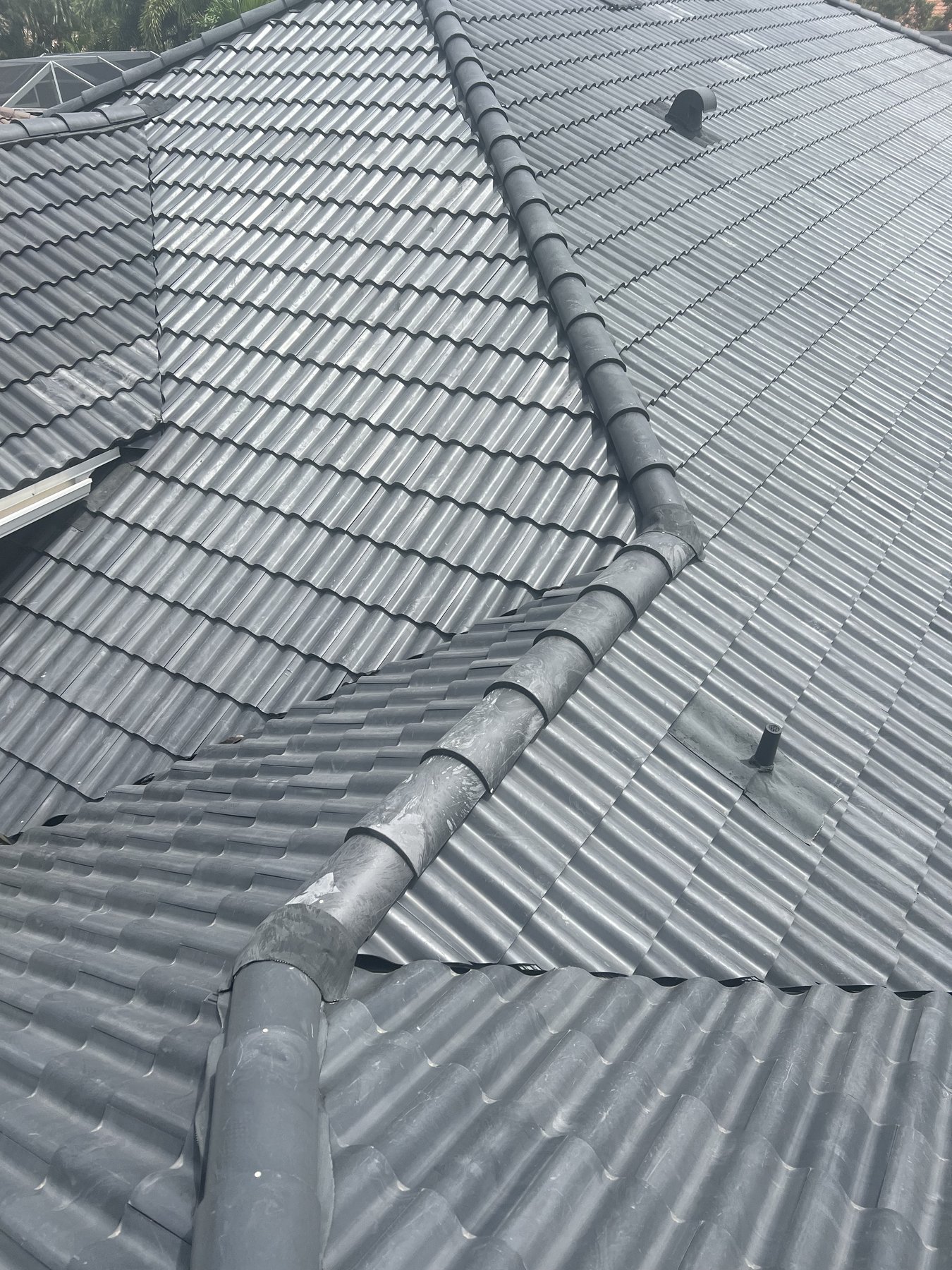 Specialty tile roofing on a complex roof